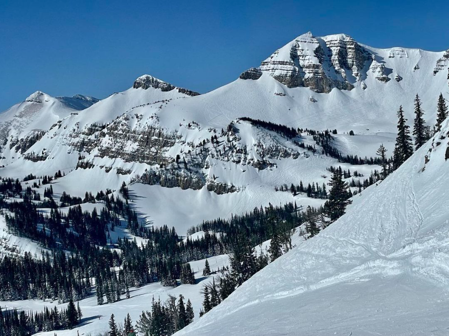 Photo of the snow covered mountains of Wyoming.